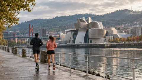 Recreación editorial fotorrealista de KROONA para 10K Bilbao Rural Kutxa, inspirada en Bilbao
